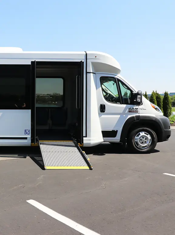 Handicap accessible vehicles in Charlotte white wheelchair accessible bus